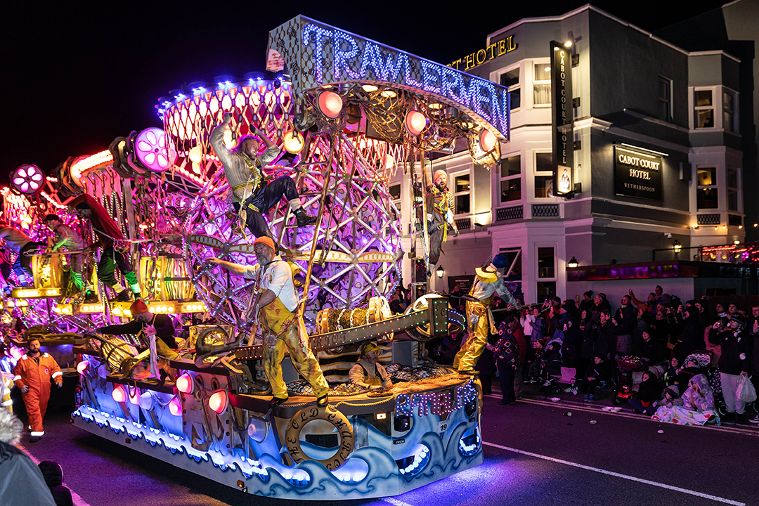 Brightly coloured purple carnival float